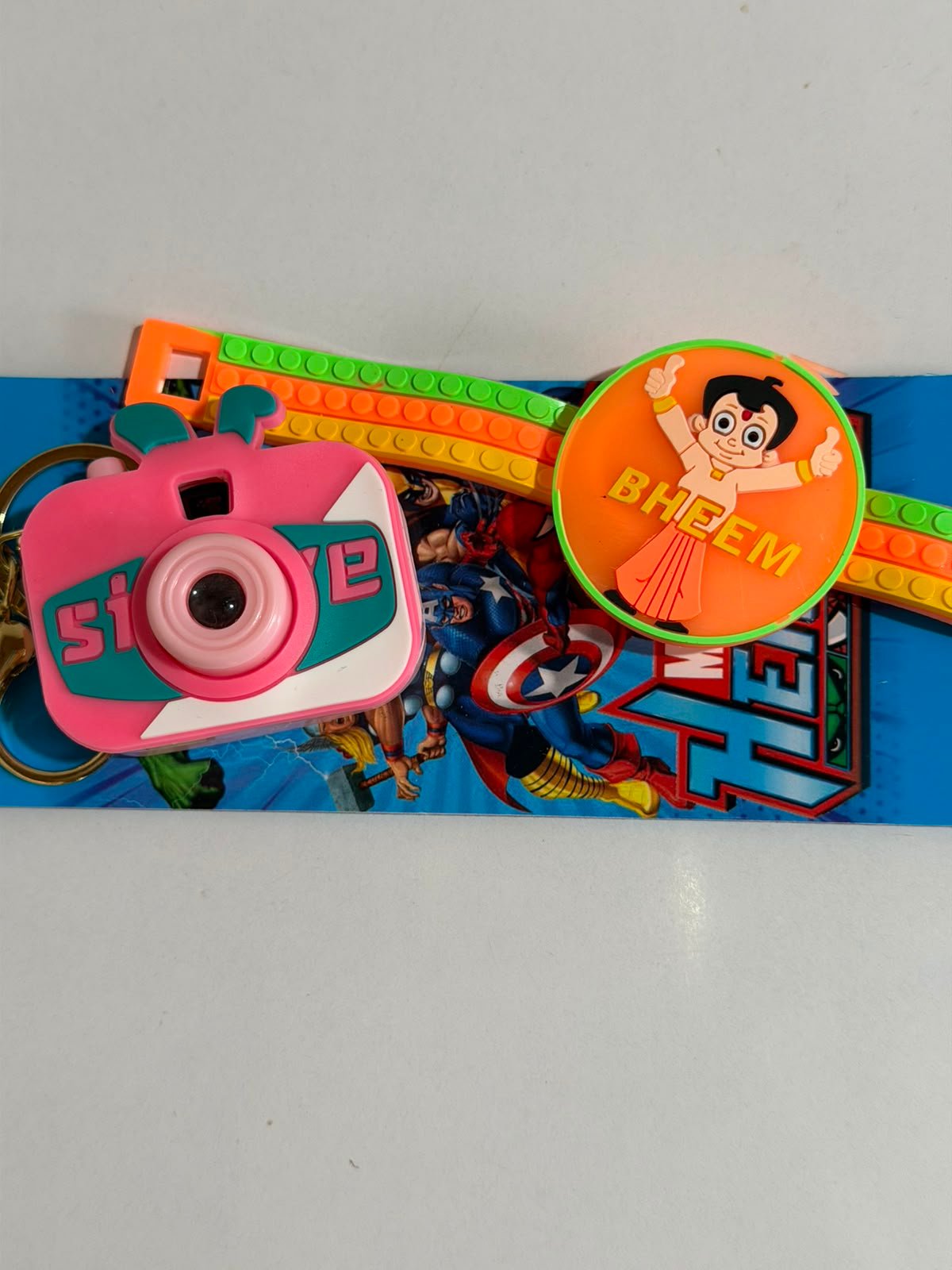 Chhota Bheem Kids Rakhi Gift Set with Mini Camera Keychain,Light Projector & Adjustable Silicone Wrist Band with LED Light - Image 2