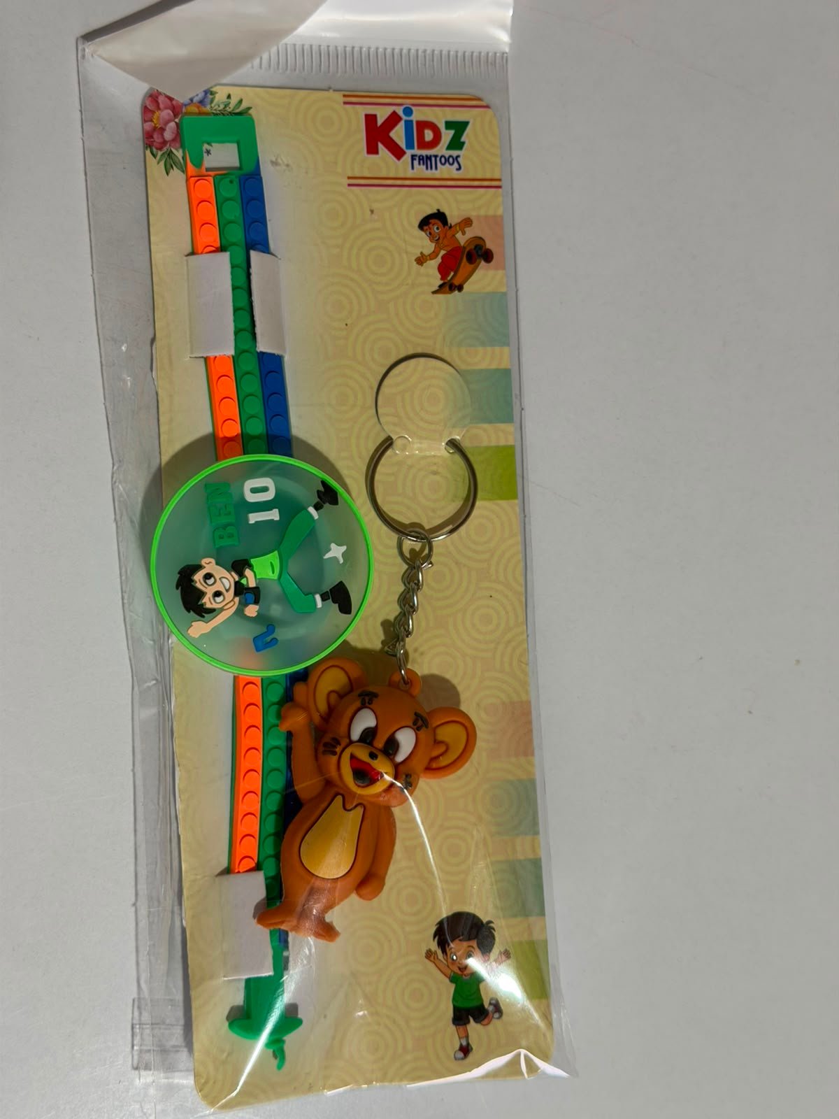 Ben 10 Silicone Slap Band Rakhi with Jerry Mouse Keychain for Kids,LED Light & Roli Tikka | Raksha Bandhan Gift